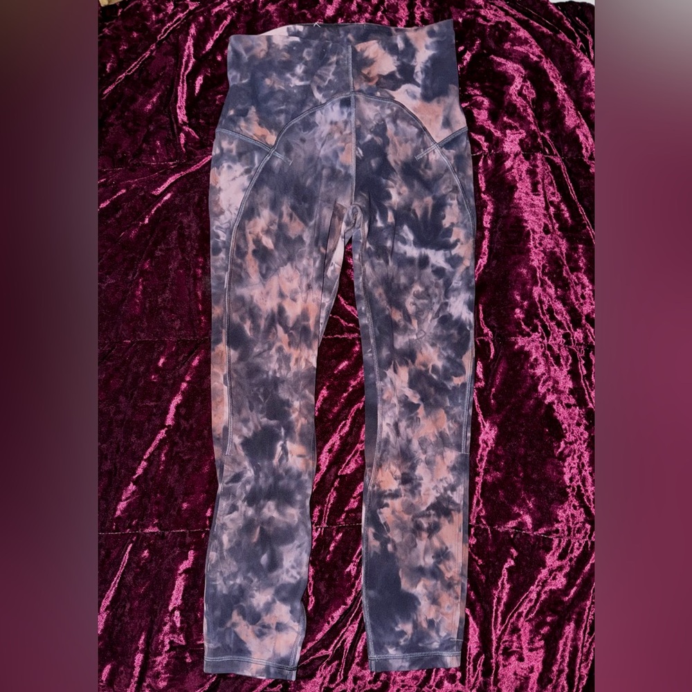 Lululemon Unlimit size 6 HR* Keyhole Diamond Dye Graphite Pink 23” leggings.